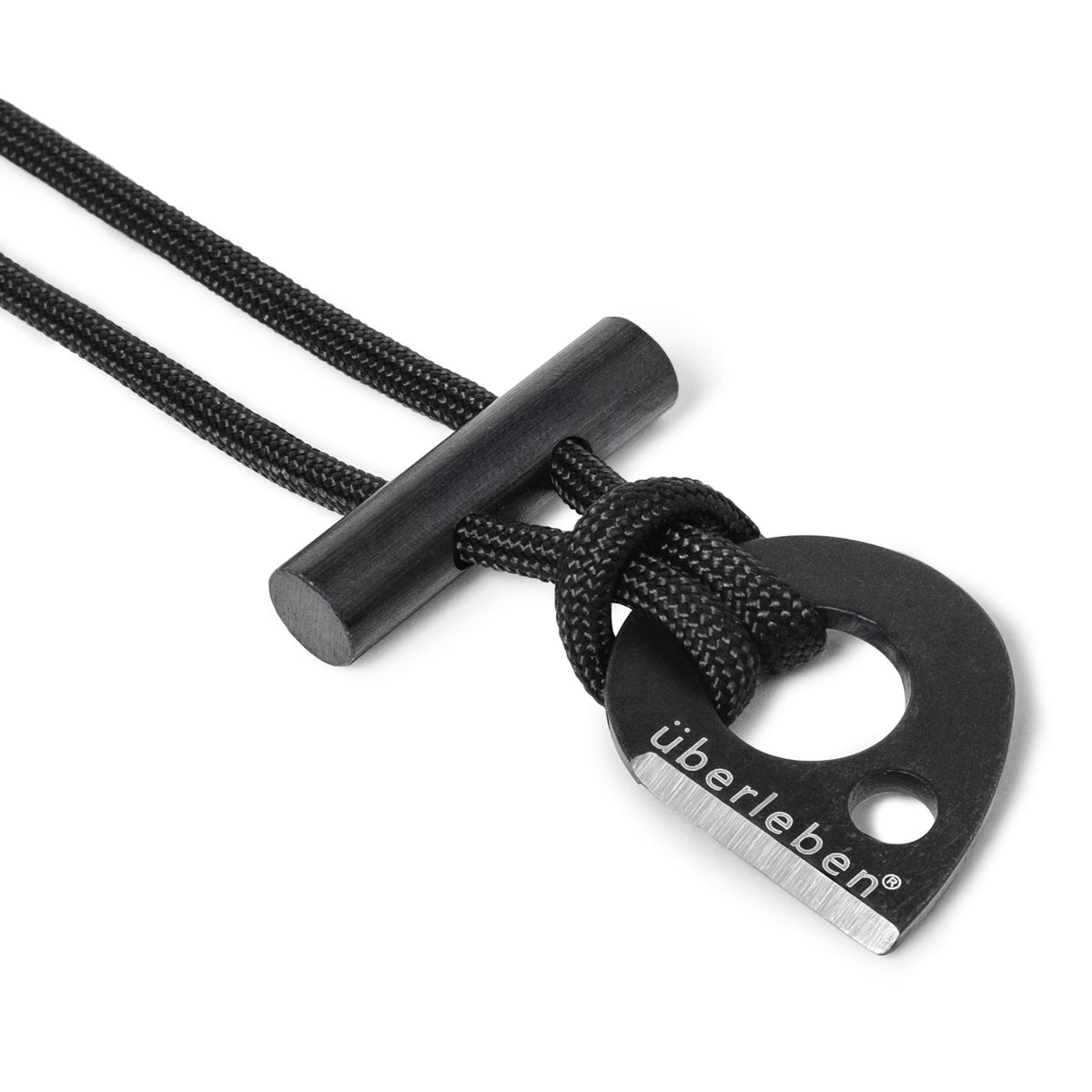 paracord necklace that has a striker and ferro rod attached to it.